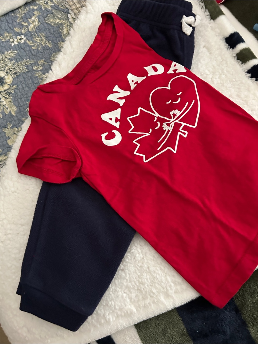 Kids Canada Red tshirt with navy fleece joggers.